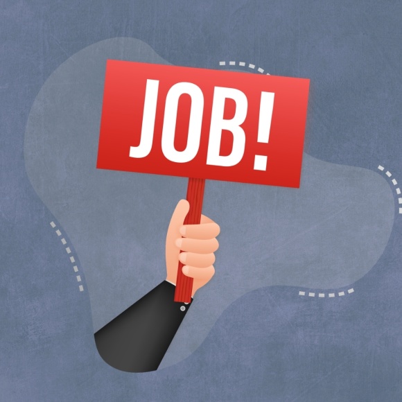 Eine hochgehobene Hand mit der Aufschrift "Job" auf einer Tafel
